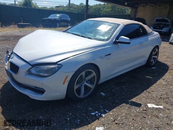 ✅ 2012 BMW 6 Series 650i xDrive • VIN: WBALZ5C50CC619897 • Лот: 43162953. Опубликован ранее на IAAI с пробегом 81 934 миль. Бесплатный доступ к архиву аукционных продаж из США и подробный отчёт об истории автомобиля на DreamBid. Изображение 2.