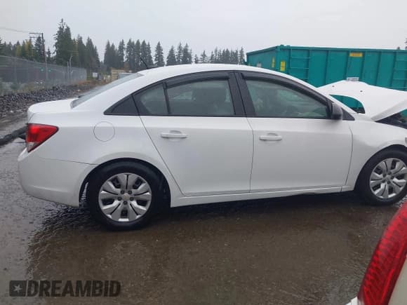 ✅ 2013 Chevrolet Cruze LS • VIN: 1G1PA5SG5D7293757 • Lot: 43527179. Listed on IAAI with 185,139 mi. Free auction sales archive from the USA and detailed vehicle history report at DreamBid. Image 14.