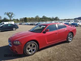 2013 Dodge Charger SXT с VIN 2C3CDXHG5DH522379, выставлен на аукционе Copart как лот 82646815 с пробегом 160 041 миль миль и Списание • Salvage title. История ставок и продаж доступна на DreamBid. Изображение 1.
