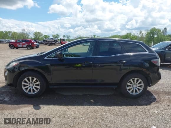 ✅ 2012 Mazda CX-7 i Touring • VIN: JM3ER2CM5C0415574 • Lot: 42263702. Wystawiony na IAAI z przebiegiem 293 566 mil. Bezpłatny archiwum sprzedaży aukcyjnych z USA i szczegółowy raport historii pojazdu na DreamBid. Zdjęcie 15.
