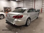 ✅ 2013 Volkswagen CC R-Line • VIN: WVWBN7AN1DE541631 • Lot: 43662152. Listed on IAAI with 127,075 mi. Free auction sales archive from the USA and detailed vehicle history report at DreamBid. Image 4.