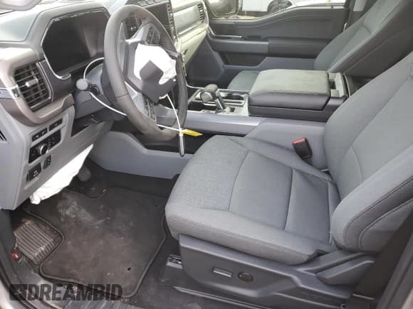 ✅ 2024 Ford F-150 Lightning XLT • VIN: 1FTVW3LK5RWG25250 • Lot: 42121695. Wystawiony na Copart z przebiegiem 492 mil. Bezpłatny archiwum sprzedaży aukcyjnych z USA i szczegółowy raport historii pojazdu na DreamBid. Zdjęcie 7.