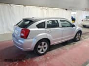 ✅ 2010 Dodge Caliber Mainstreet • VIN: 1B3CB3HA0AD599676 • Лот: 89916905. Опубликован ранее на Copart с пробегом 88 102 миль. Бесплатный доступ к архиву аукционных продаж из США и подробный отчёт об истории автомобиля на DreamBid. Изображение 3.