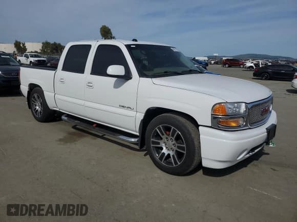 ✅ 2005 GMC Sierra Denali • VIN: 2GTEK63N951344416 • Lot: 45877865. Listed on Copart with 150,707 mi. Free auction sales archive from the USA and detailed vehicle history report at DreamBid. Image 4.