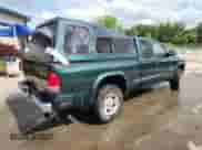 2002 Dodge Dakota SLT with VIN 1B7GG42N52S717818, listed as a Copart auction lot 61561785 with 133,580 mi miles and Non repairable. Bid and sale history available at DreamBid. Image 3.