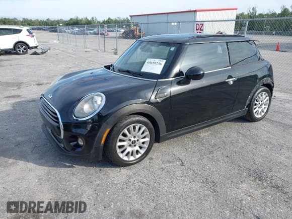 ✅ 2016 MINI Hardtop • VIN: WMWXP5C58G2D14749 • Lot: 43659236. Listed on IAAI with 92,614 mi. Free auction sales archive from the USA and detailed vehicle history report at DreamBid. Image 17.