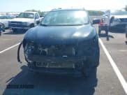 ✅ 2018 Nissan Rogue S • VIN: JN1BJ1CPXJW164412 • Lot: 41996230. Listed on IAAI with 103,325 mi. Free auction sales archive from the USA and detailed vehicle history report at DreamBid. Image 12.