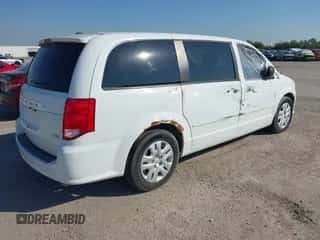 2015 Dodge Grand Caravan American Value z VIN 2C4RDGBG7FR658458, wystawiony jako IAAI lot #43202915 z przebiegiem 234 864 mil mil oraz . Historia ofert i sprzedaży dostępna na DreamBid. Obrazek 4.