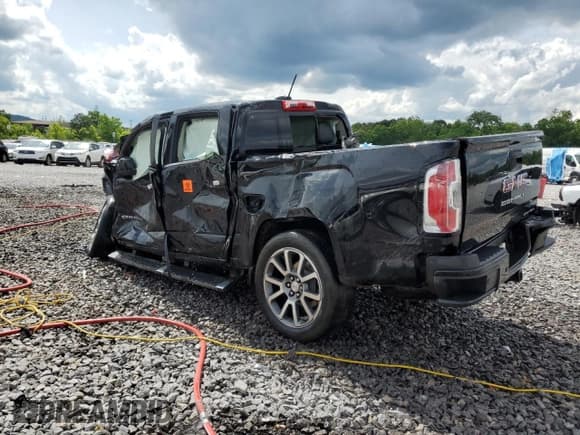 ✅ 2021 GMC Canyon 4WD Denali • VIN: 1GTG6EEN5M1142648 • Лот: 58559805. Опубликован ранее на Copart с пробегом Не указан. Бесплатный доступ к архиву аукционных продаж из США и подробный отчёт об истории автомобиля на DreamBid. Изображение 2.