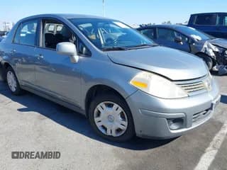 ✅ 2009 Nissan Versa S • VIN: 3N1BC11E09L449889 • Lot: 42769264. Listed on IAAI with 180,212 mi. Free auction sales archive from the USA and detailed vehicle history report at DreamBid. Image 1.