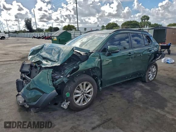 ✅ 2022 Toyota Corolla Cross LE • VIN: 7MUBAAAG7NV033997 • Lot: 94138365. Listed on Copart with 57,382 mi. Free auction sales archive from the USA and detailed vehicle history report at DreamBid. Image 1.