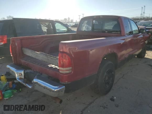 ✅ 1999 Dodge Dakota SLT • VIN: 1B7GL22X6XS165559 • Lot: 42640735. Wystawiony na Copart z przebiegiem 170 219 mil. Bezpłatny archiwum sprzedaży aukcyjnych z USA i szczegółowy raport historii pojazdu na DreamBid. Zdjęcie 3.