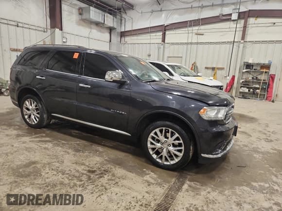 ✅ 2014 Dodge Durango Citadel • VIN: 1C4RDJEGXEC978468 • Lot: 91618895. Listed on Copart with 193,236 mi. Free auction sales archive from the USA and detailed vehicle history report at DreamBid. Image 4.