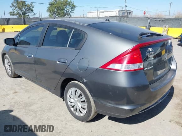 ✅ 2010 Honda Insight LX • VIN: JHMZE2H5XAS033628 • Lot: 42326613. Listed on IAAI with 239,068 mi. Free auction sales archive from the USA and detailed vehicle history report at DreamBid. Image 3.