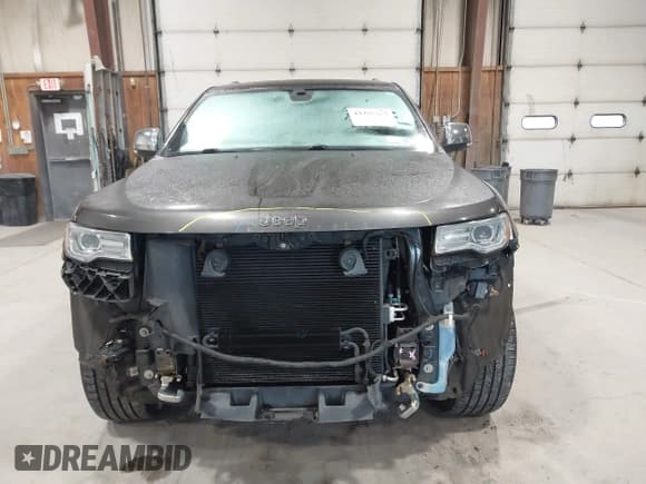 ✅ 2014 Jeep Grand Cherokee Overland • VIN: 1C4RJFCGXEC340052 • Lot: 43485667. Listed on IAAI with 113,840 mi. Free auction sales archive from the USA and detailed vehicle history report at DreamBid. Image 12.