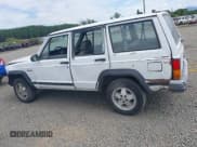 ✅ 1993 Jeep Cherokee • VIN: 1J4FT28PXPL560996 • Lot: 42526590. Listed on IAAI with 304,201 mi. Free auction sales archive from the USA and detailed vehicle history report at DreamBid. Image 6.