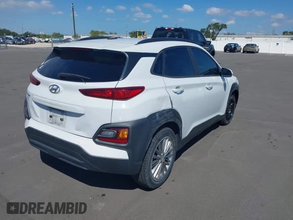 ✅ 2018 Hyundai Kona SEL • VIN: KM8K62AA5JU073459 • Лот: 43352612. Опубликован ранее на IAAI с пробегом 77 655 миль. Бесплатный доступ к архиву аукционных продаж из США и подробный отчёт об истории автомобиля на DreamBid. Изображение 4.