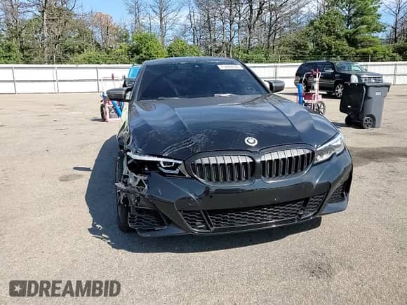 2022 BMW 3 Series 330i xDrive z VIN 3MW5R7J05N8C70306, wystawiony jako Copart lot #71299635 z przebiegiem 42 128 mil mil oraz Szkoda całkowita • Salvage title. Historia ofert i sprzedaży dostępna na DreamBid. Obrazek 13.