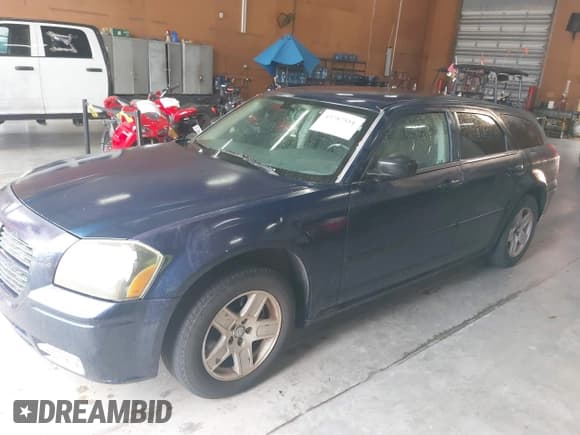 ✅ 2005 Dodge Magnum SE • VIN: 2D4FV48V75H680066 • Lot: 43787551. Listed on IAAI with 213,809 mi. Free auction sales archive from the USA and detailed vehicle history report at DreamBid. Image 2.