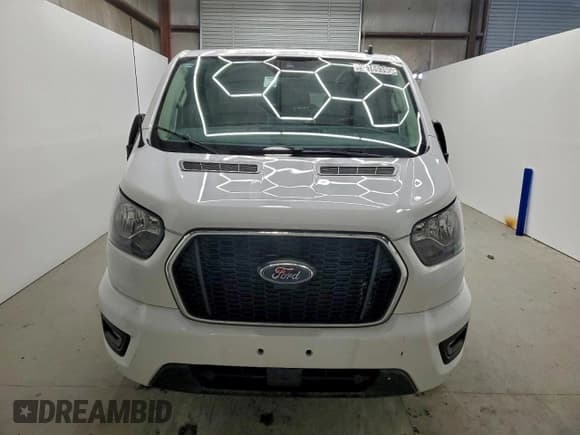 ✅ 2023 Ford Transit Passenger XLT • VIN: 1FBAX2YGXPKA94145 • Лот: 94169395. Опубликован ранее на Copart с пробегом 61 374 миль. Бесплатный доступ к архиву аукционных продаж из США и подробный отчёт об истории автомобиля на DreamBid. Изображение 5.