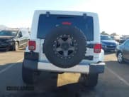 ✅ 2015 Jeep Wrangler Unlimited Sahara • VIN: 1C4BJWEG9FL519182 • Lot: 43672663. Listed on IAAI with 107,421 mi. Free auction sales archive from the USA and detailed vehicle history report at DreamBid. Image 16.