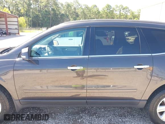 2014 Chevrolet Traverse LT with VIN 1GNKRHKD6EJ117426, listed as a IAAI auction lot 43116597 with 160,355 mi miles and . Bid and sale history available at DreamBid. Image 14.