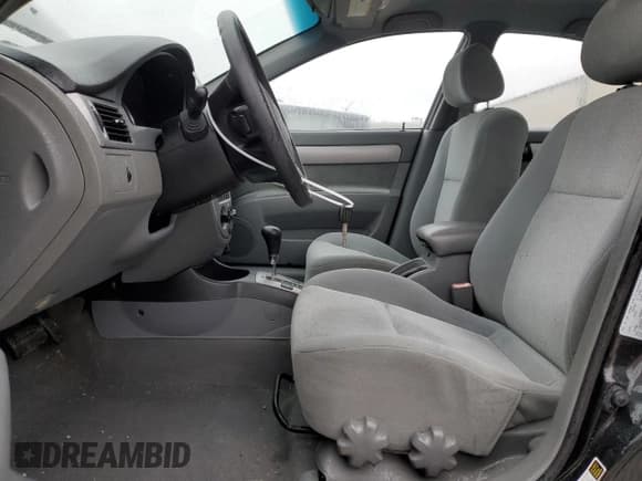 ✅ 2005 Suzuki Forenza S • VIN: KL5JD56Z65K100830 • Lot: 85256494. Listed on Copart with 74,543 mi. Free auction sales archive from the USA and detailed vehicle history report at DreamBid. Image 7.