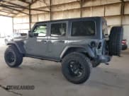 ✅ 2022 Jeep Wrangler Unlimited High Tide • VIN: 1C4HJXDG2NW221829 • Lot: 64836074. Listed on Copart with 3,394 mi. Free auction sales archive from the USA and detailed vehicle history report at DreamBid. Image 2.