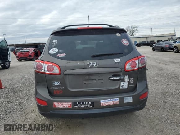 ✅ 2012 Hyundai Santa Fe Limited • VIN: 5XYZK4AG1CG156812 • Lot: 87953285. Listed on Copart with 186,428 mi. Free auction sales archive from the USA and detailed vehicle history report at DreamBid. Image 6.