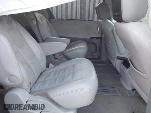 ✅ 2013 Toyota Sienna XLE AAS • VIN: 5TDYK3DC1DS400235 • Lot: 43493994. Listed on IAAI with 122,357 mi. Free auction sales archive from the USA and detailed vehicle history report at DreamBid. Image 8.