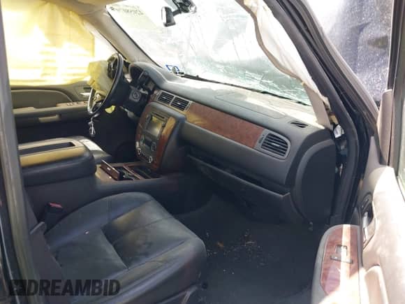 2008 Chevrolet Tahoe 2LT z VIN 1GNFC13JX8R107504, wystawiony jako IAAI lot #42058079 z przebiegiem Nie podano mil oraz . Historia ofert i sprzedaży dostępna na DreamBid. Obrazek 5.