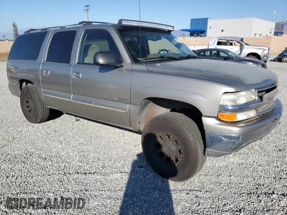 2000 Chevrolet Suburban LS с VIN 3GNEC16TXYG190988, выставлен на аукционе Copart как лот 80372284 с пробегом 152 279 миль миль и Списание • Salvage title. История ставок и продаж доступна на DreamBid. Изображение 4.