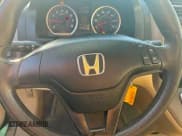 ✅ 2007 Honda CR-V LX • VIN: JHLRE383X7C051106 • Лот: 95781155. Опубликован ранее на Copart с пробегом 148 358 миль. Бесплатный доступ к архиву аукционных продаж из США и подробный отчёт об истории автомобиля на DreamBid. Изображение 13.