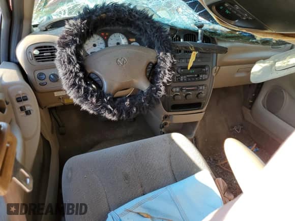 2003 Dodge Caravan Sport with VIN 2D4GP44LX3R211838, listed as a Copart auction lot 74988804 with 107,783 mi miles and Salvage title. Bid and sale history available at DreamBid. Image 8.