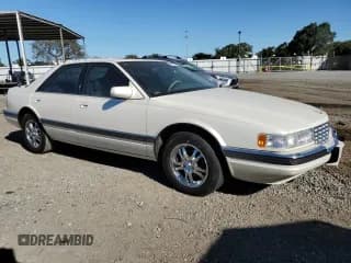 ✅ 1996 Cadillac Seville Luxury SLS • VIN: 1G6KS52YXTU800369 • Lot: 79962924. Wystawiony na Copart z przebiegiem 83 858 mil. Bezpłatny archiwum sprzedaży aukcyjnych z USA i szczegółowy raport historii pojazdu na DreamBid. Zdjęcie 4.