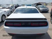 ✅ 2023 Dodge Challenger R/T Scat Pack Widebody • VIN: 2C3CDZFJ3PH662400 • Lot: 42432302. Listed on IAAI with 15,615 mi. Free auction sales archive from the USA and detailed vehicle history report at DreamBid. Image 17.