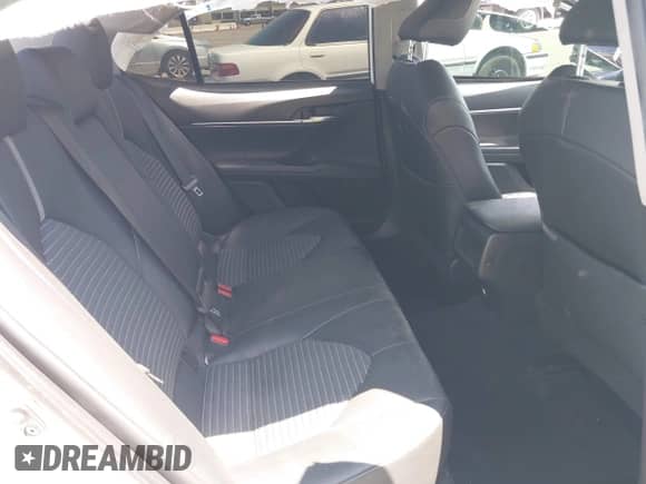 2022 Toyota Camry SE z VIN 4T1T11AK9NU047717, wystawiony jako IAAI lot #42316618 z przebiegiem 86 410 mil mil oraz . Historia ofert i sprzedaży dostępna na DreamBid. Obrazek 8.