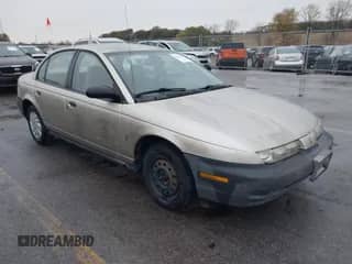 1998 Saturn SL z VIN 1G8ZH5289WZ313076, wystawiony jako IAAI lot #43542802 z przebiegiem 196 837 mil mil oraz . Historia ofert i sprzedaży dostępna na DreamBid. Obrazek 1.