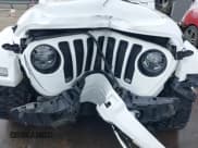 ✅ 2021 Jeep Wrangler Unlimited Sahara • VIN: 1C4HJXEG1MW597127 • Lot: 43354032. Listed on IAAI with 82,436 mi. Free auction sales archive from the USA and detailed vehicle history report at DreamBid. Image 6.