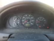 ✅ 2002 Mazda Protege DX • VIN: JM1BJ225921608283 • Лот: 80679005. Опубликован ранее на Copart с пробегом 147 000 миль. Бесплатный доступ к архиву аукционных продаж из США и подробный отчёт об истории автомобиля на DreamBid. Изображение 9.