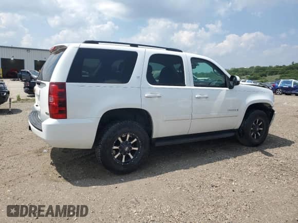 2007 Chevrolet Tahoe LTZ с VIN 1GNFK13097J255473, выставлен на аукционе Copart как лот 68166135 с пробегом 168 573 миль миль и Списание • Salvage title. История ставок и продаж доступна на DreamBid. Изображение 3.