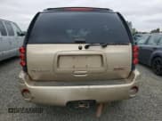 ✅ 2006 GMC Envoy SLT • VIN: 1GKDS13S662250391 • Лот: 62329035. Опубликован ранее на Copart с пробегом 184 005 миль. Бесплатный доступ к архиву аукционных продаж из США и подробный отчёт об истории автомобиля на DreamBid. Изображение 6.