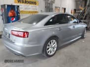 ✅ 2017 Audi A6 Prestige • VIN: WAUH2AFC1HN081865 • Лот: 42733164. Опубликован ранее на IAAI с пробегом 56 750 миль. Бесплатный доступ к архиву аукционных продаж из США и подробный отчёт об истории автомобиля на DreamBid. Изображение 4.