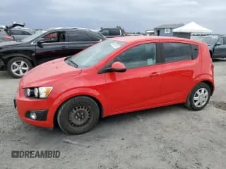 ✅ 2014 Chevrolet Sonic LS • VIN: 1G1JA6SG5E4125521 • Lot: 84605765. Listed on Copart with 89,219 mi. Free auction sales archive from the USA and detailed vehicle history report at DreamBid. Image 1.