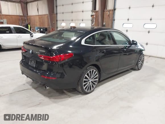 ✅ 2021 BMW 2 Series 228i xDrive • VIN: WBA73AK01M7G37453 • Lot: 43170625. Listed on IAAI with 64,202 mi. Free auction sales archive from the USA and detailed vehicle history report at DreamBid. Image 4.