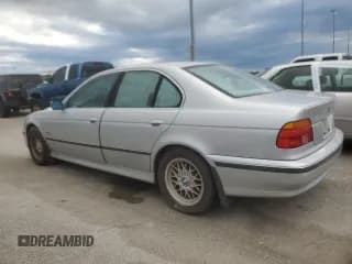✅ 1999 BMW 5 Series 528i • VIN: WBADM6332XBY30585 • Lot: 74830704. Listed on Copart with Not provided. Free auction sales archive from the USA and detailed vehicle history report at DreamBid. Image 2.