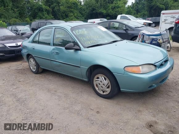 ✅ 1999 Ford Escort LX • VIN: 1FAFP10P5XW210499 • Lot: 42935783. Listed on IAAI with 73,567 mi. Free auction sales archive from the USA and detailed vehicle history report at DreamBid. Image 1.