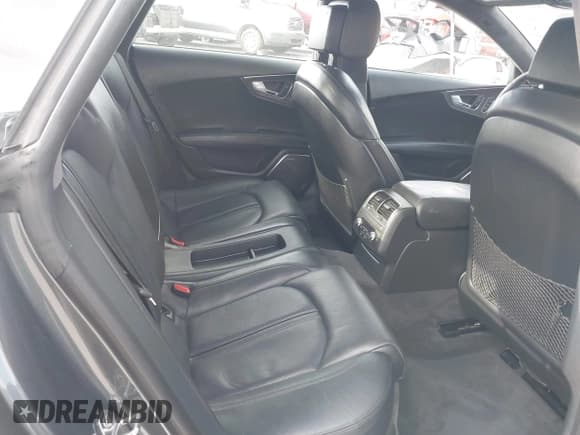 ✅ 2014 Audi RS 7 Prestige • VIN: WUAW2AFC3EN903462 • Lot: 42082052. Wystawiony na IAAI z przebiegiem 78 188 mil. Bezpłatny archiwum sprzedaży aukcyjnych z USA i szczegółowy raport historii pojazdu na DreamBid. Zdjęcie 8.