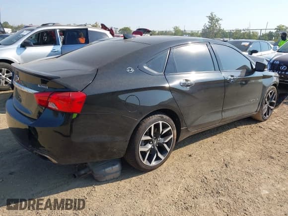 ✅ 2017 Chevrolet Impala Premier • VIN: 2G1145S37H9189270 • Lot: 43240370. Listed on IAAI with 101,185 mi. Free auction sales archive from the USA and detailed vehicle history report at DreamBid. Image 4.
