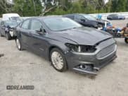 ✅ 2016 Ford Fusion SE Hybrid • VIN: 3FA6P0LU0GR101642 • Lot: 87397785. Listed on Copart with 109,371 mi. Free auction sales archive from the USA and detailed vehicle history report at DreamBid. Image 4.